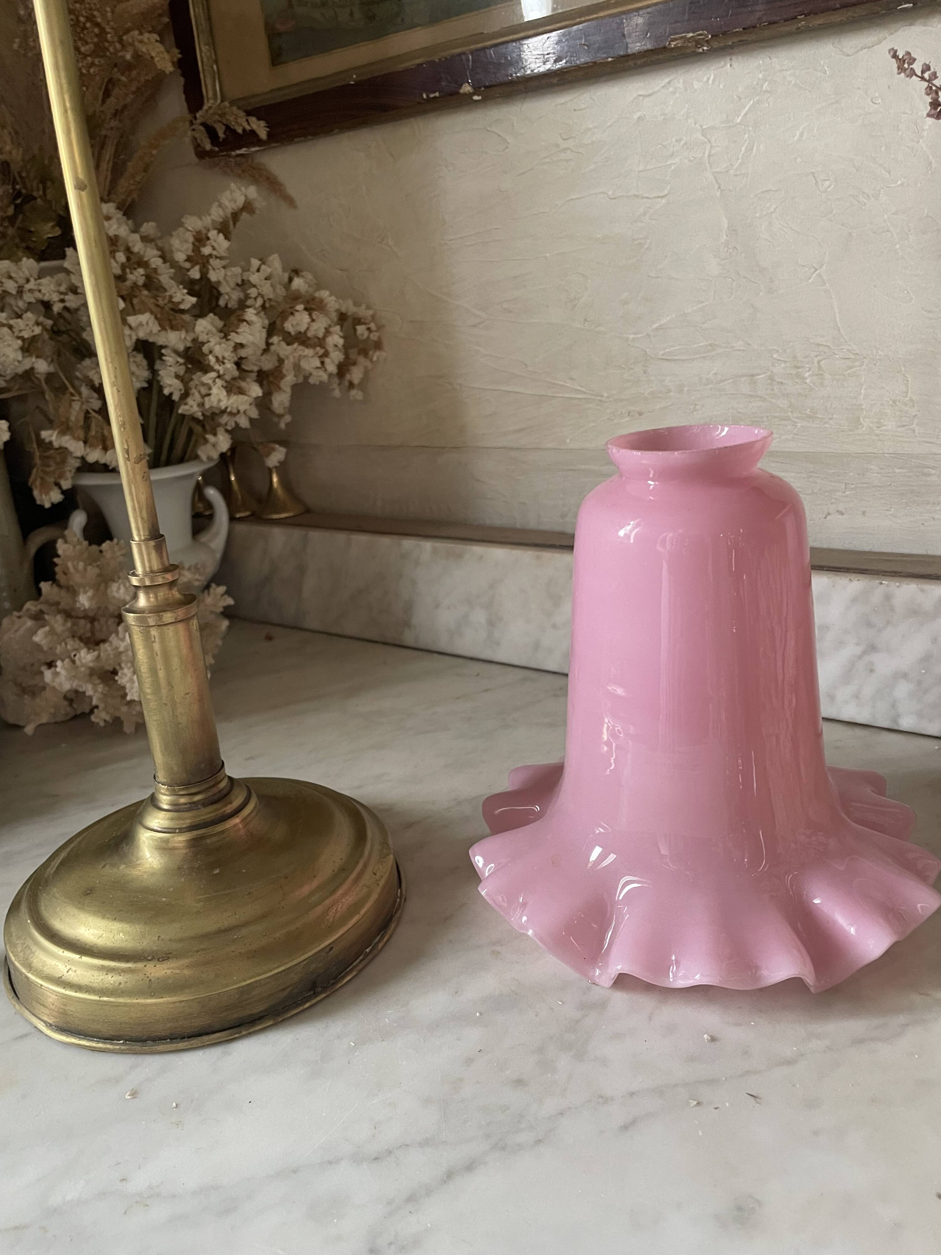Large vintage lamp in brass with a pink opaline shade.