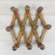Extendable wall coat rack