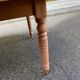 Round extendable banquet table stripped in solid mahogany with 4 extensions, 19th century.