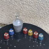 Liquor service consisting of a carafe and 6 small shot glasses, vintage houndstooth pattern