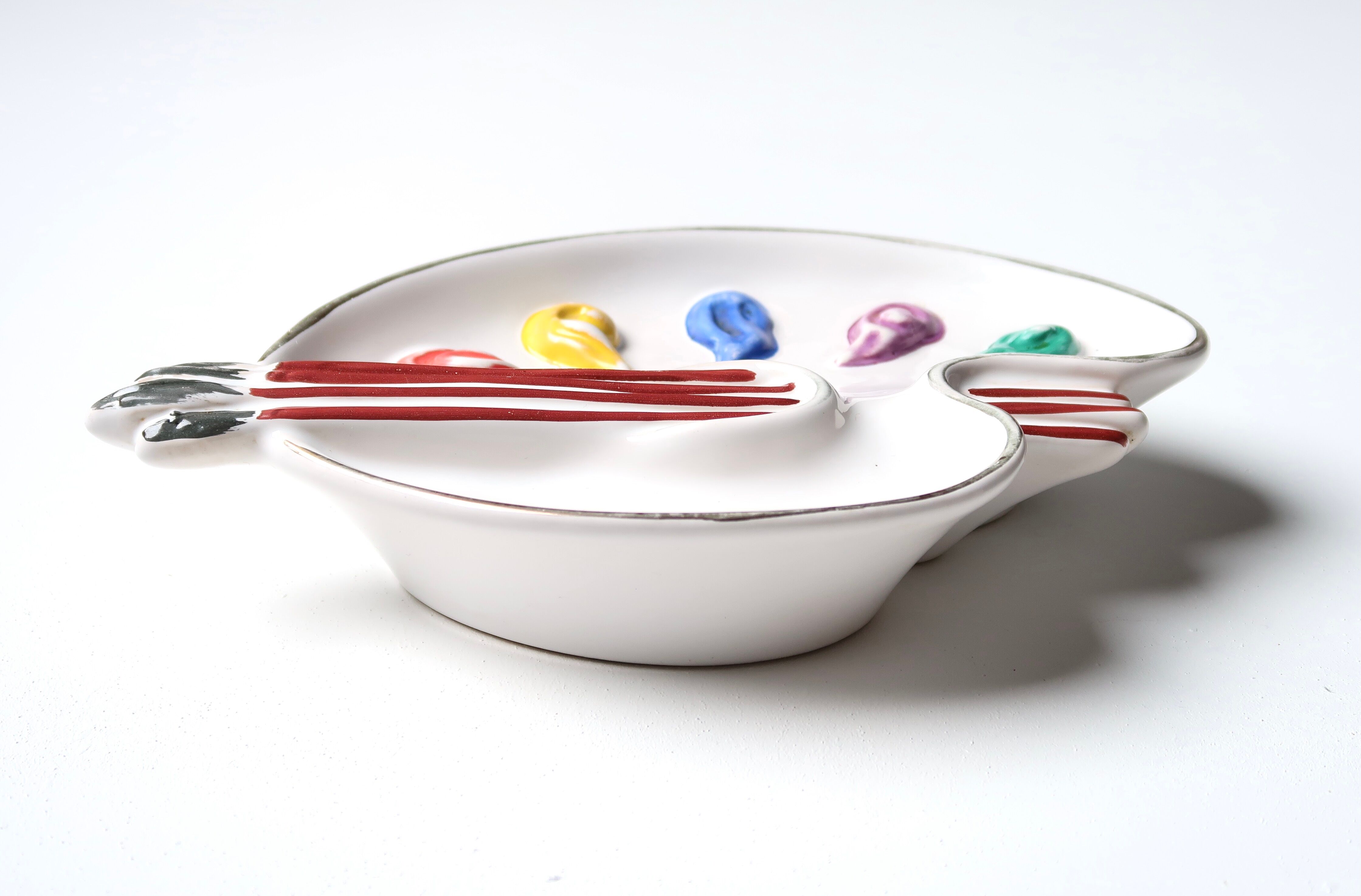 Empty pocket ceramic paint palette, 50s