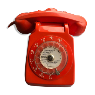 Téléphone vintage orange année 70