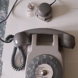 Wall telephone with dial with amplifier
