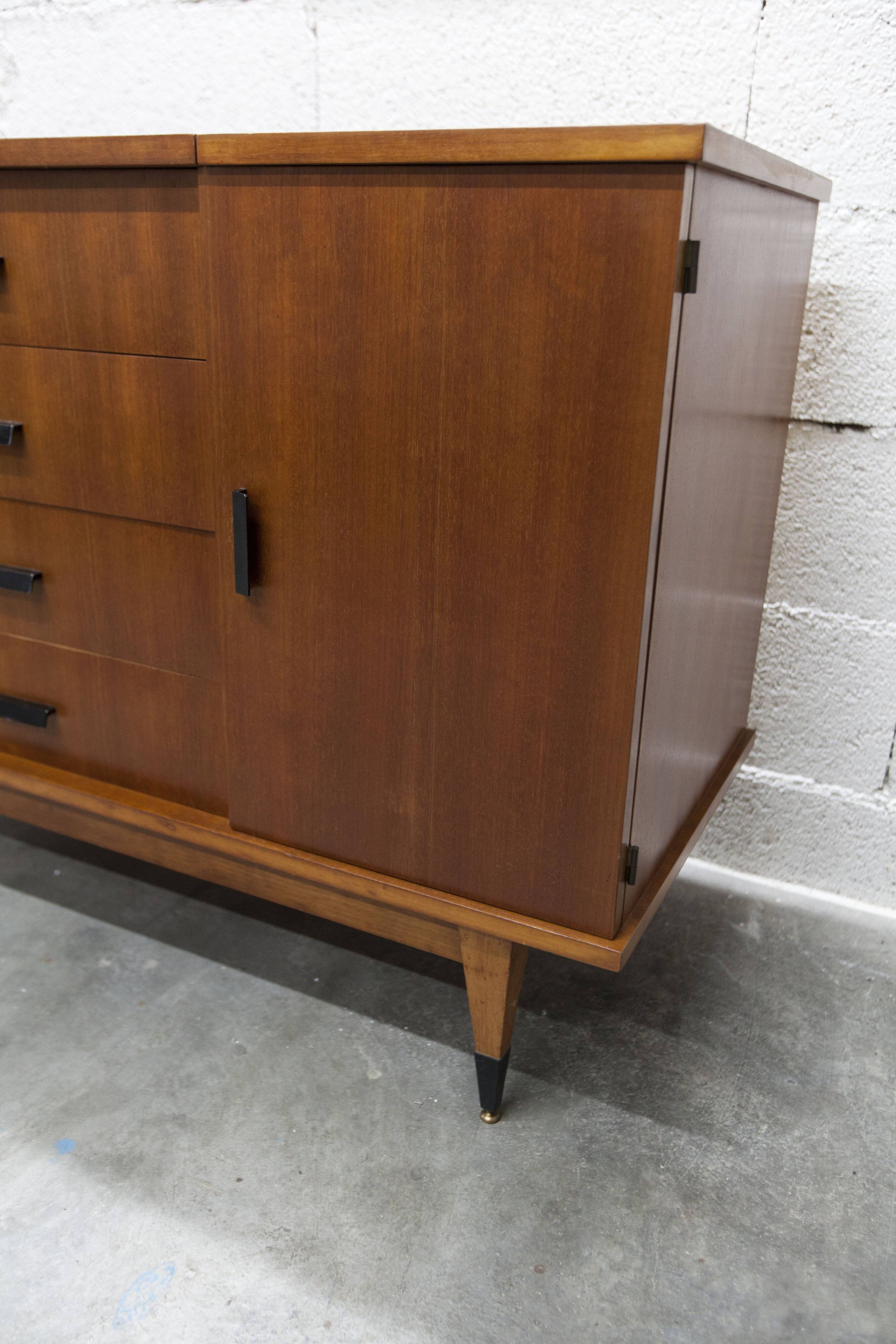 1960s teak sideboard with 4 drawers, 2 doors, and a mirror.