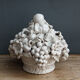 Ornamental basket decorated with trompe l'oeil fruits