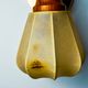 Pair of articulated "Cocoon" wall lights, resin and pine, Italy, 1970