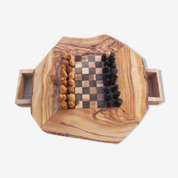 Rustic handmade chessboard made of olive wood