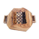 Rustic handmade chessboard made of olive wood