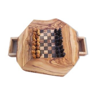 Rustic handmade chessboard made of olive wood