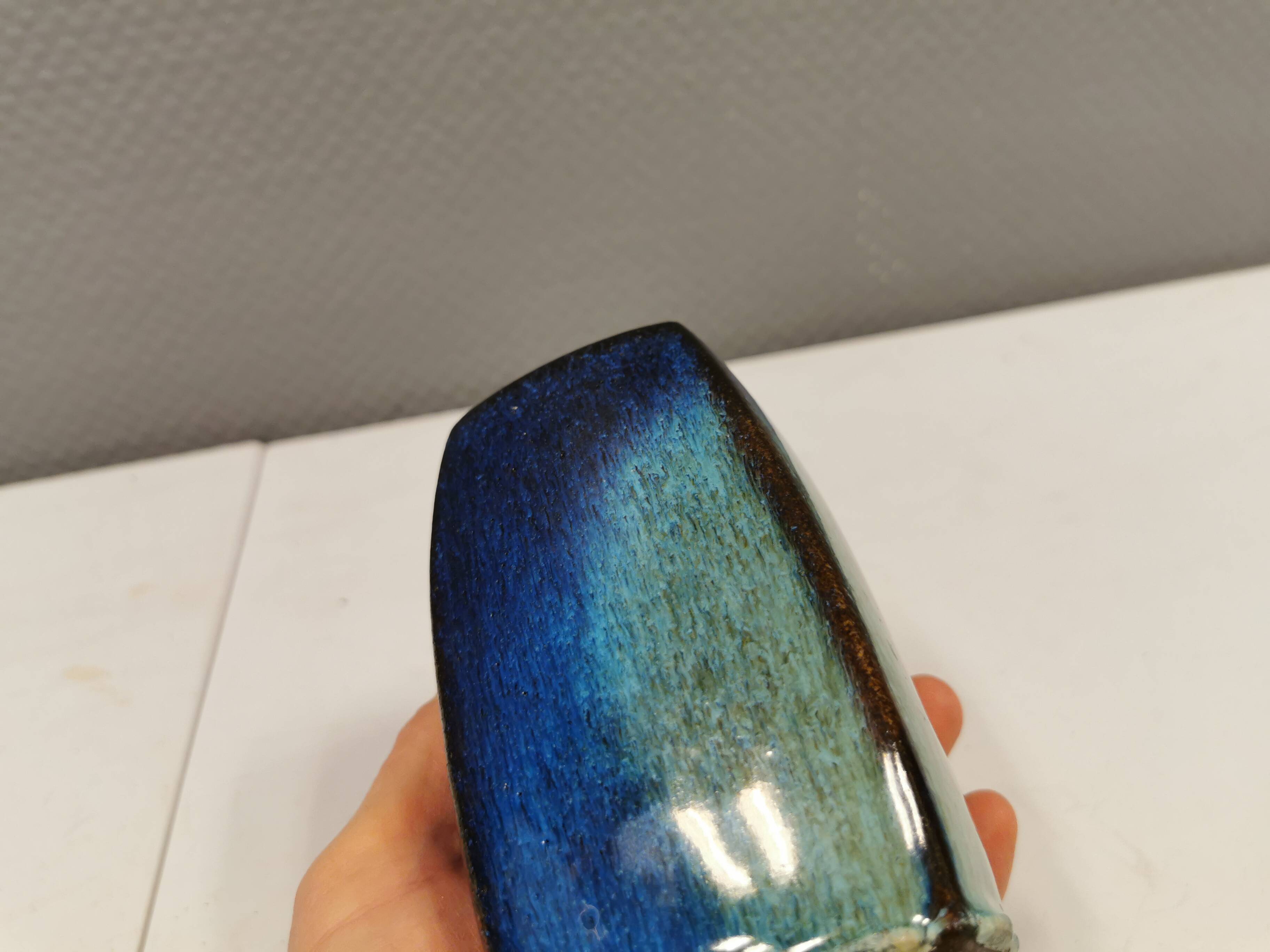 Vase in several shades of blue, from Danish Stogo art pottery. Estimated 1970-1980s