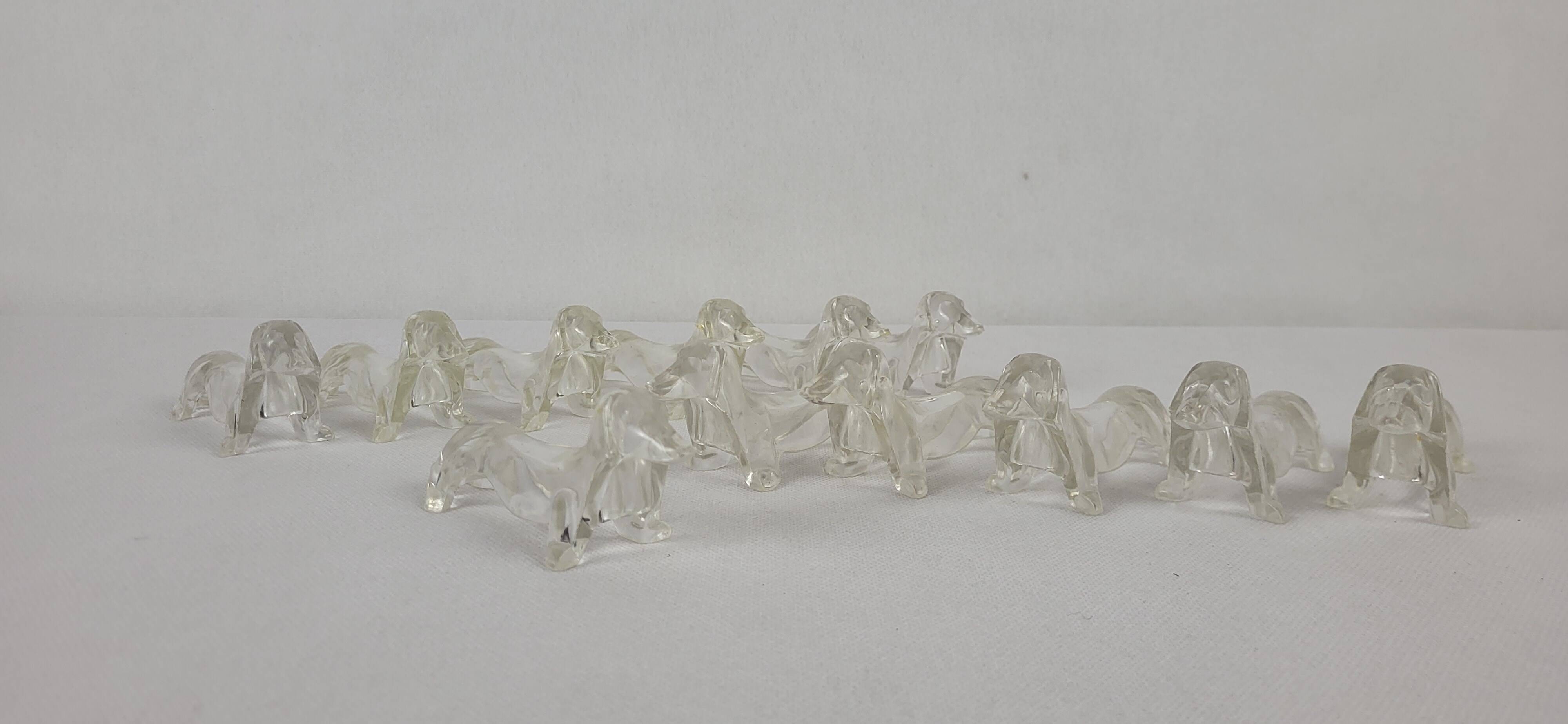 12 plastic dachshund/bassett knife holders 1970s