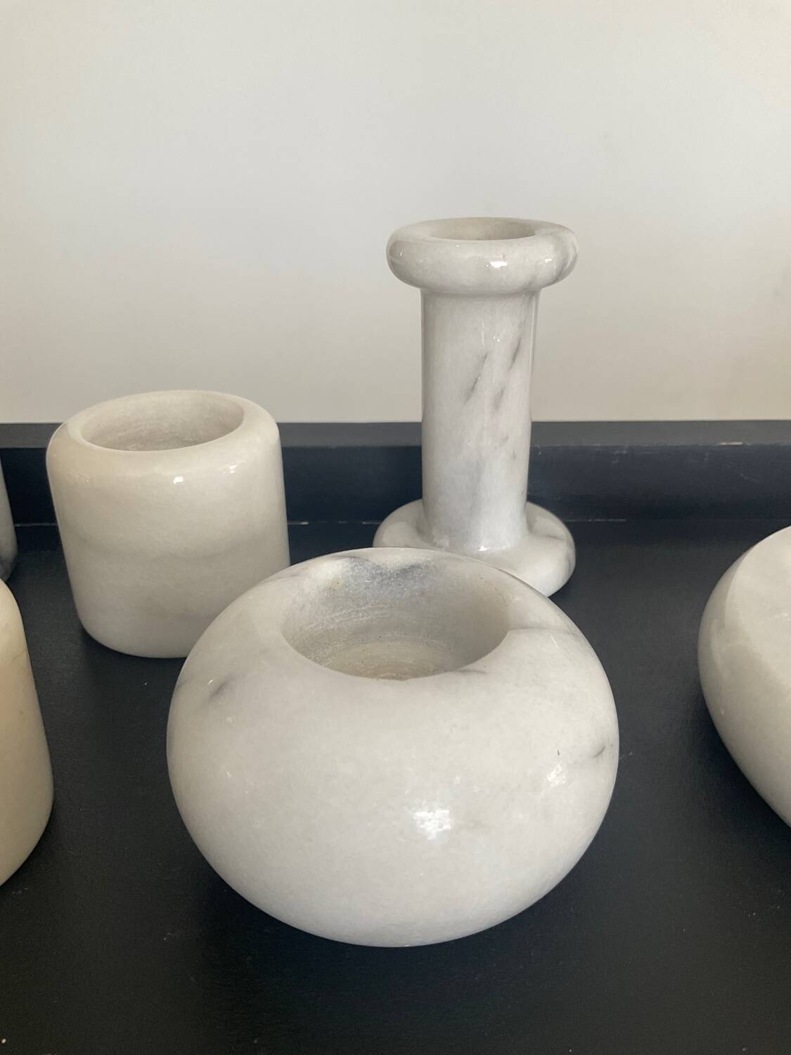 Series of 7 vintage Carrara marble candlesticks