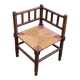 19th-century turned wooden corner chair with rush seating.