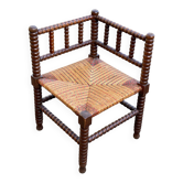 19th-century turned wooden corner chair with rush seating.
