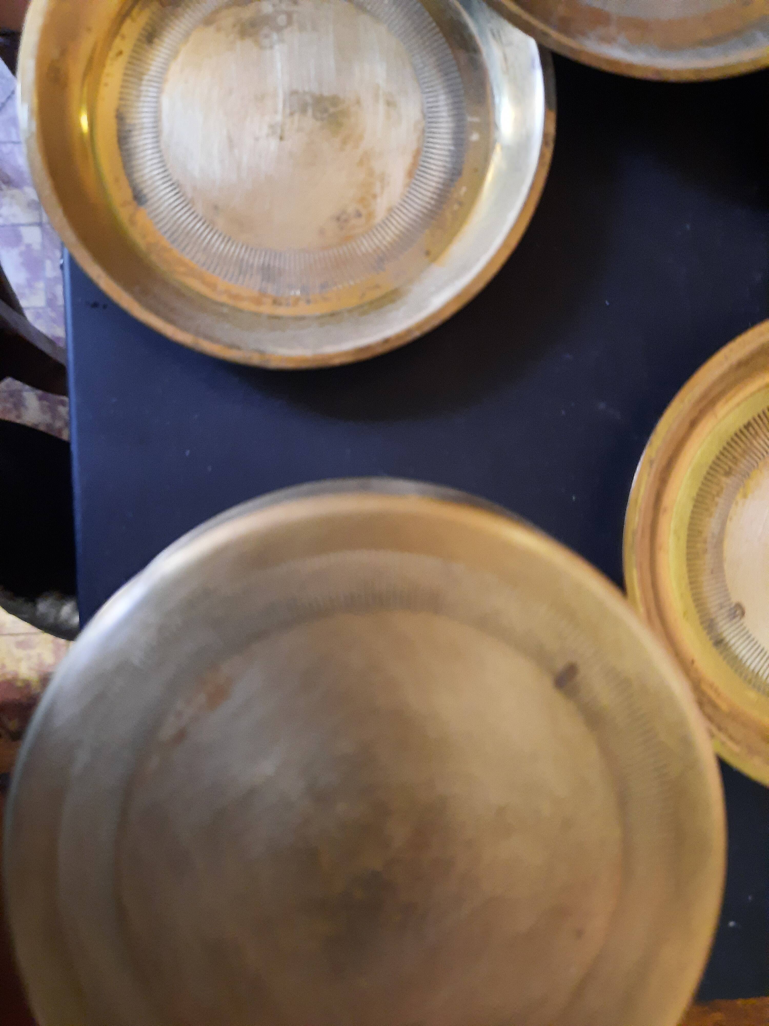 Set of brass coasters