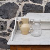 Beige ceramic pitcher