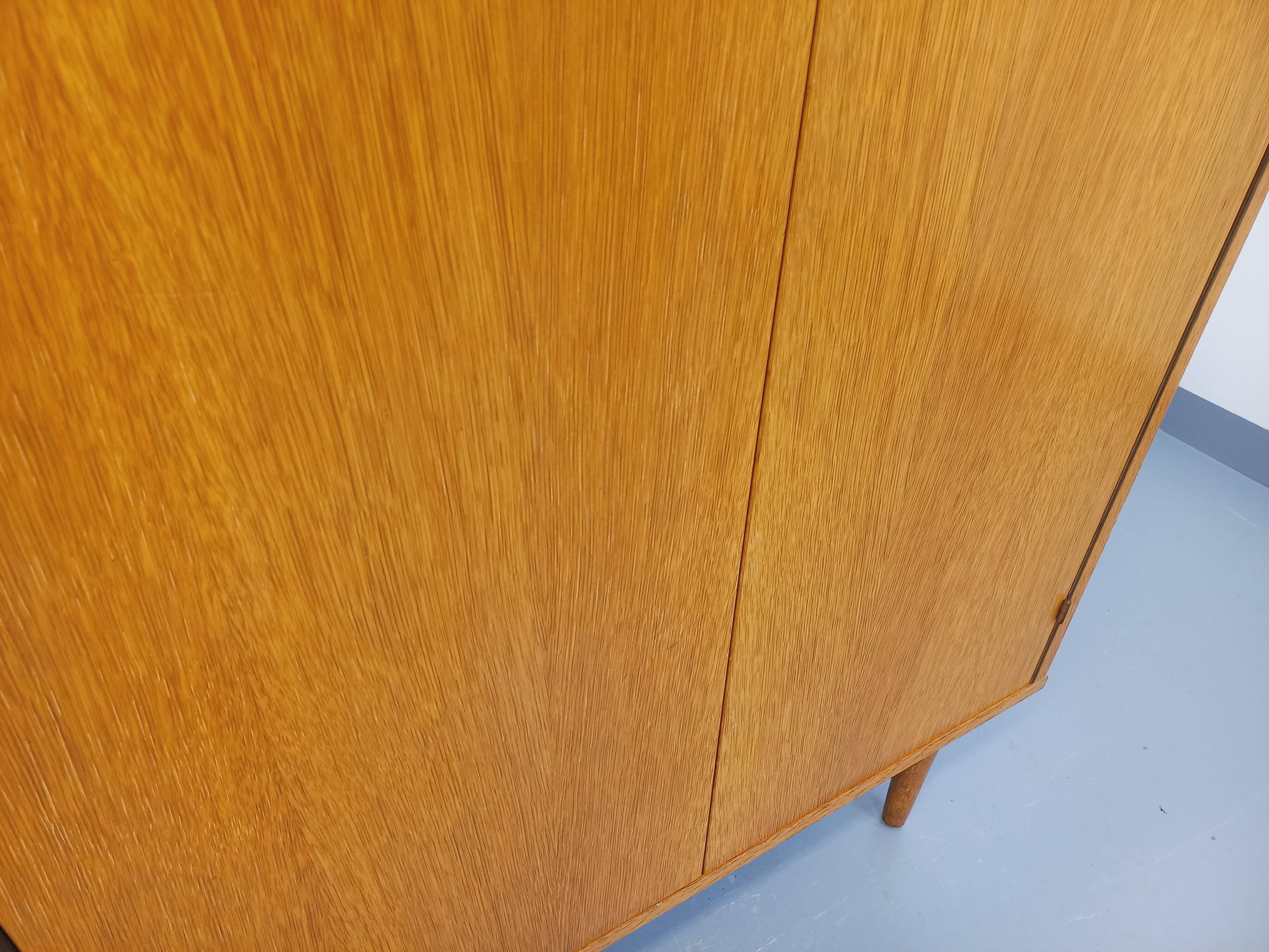 Vintage oak wardrobe from the 1960s.