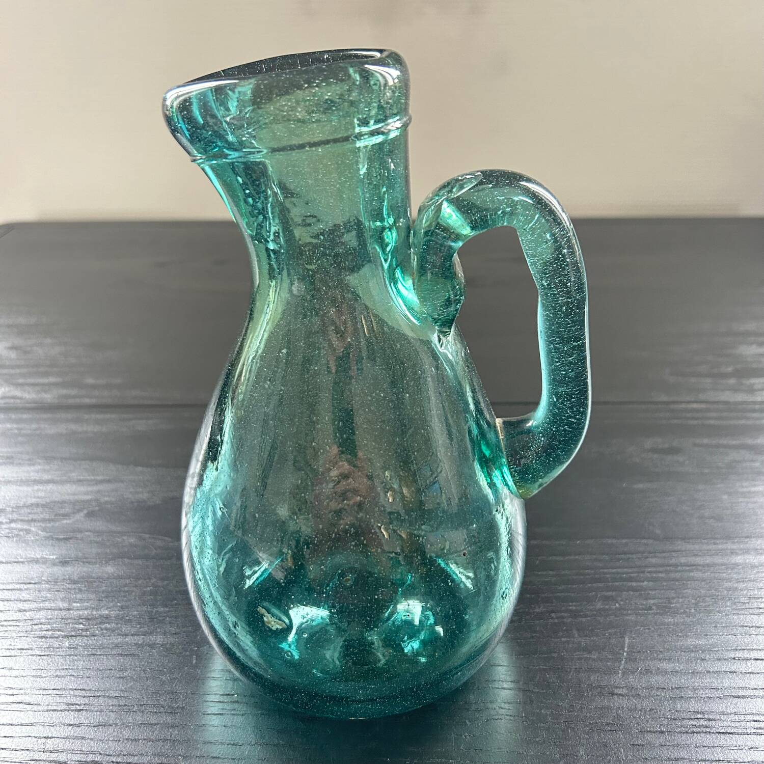 Bluish blown glass carafe