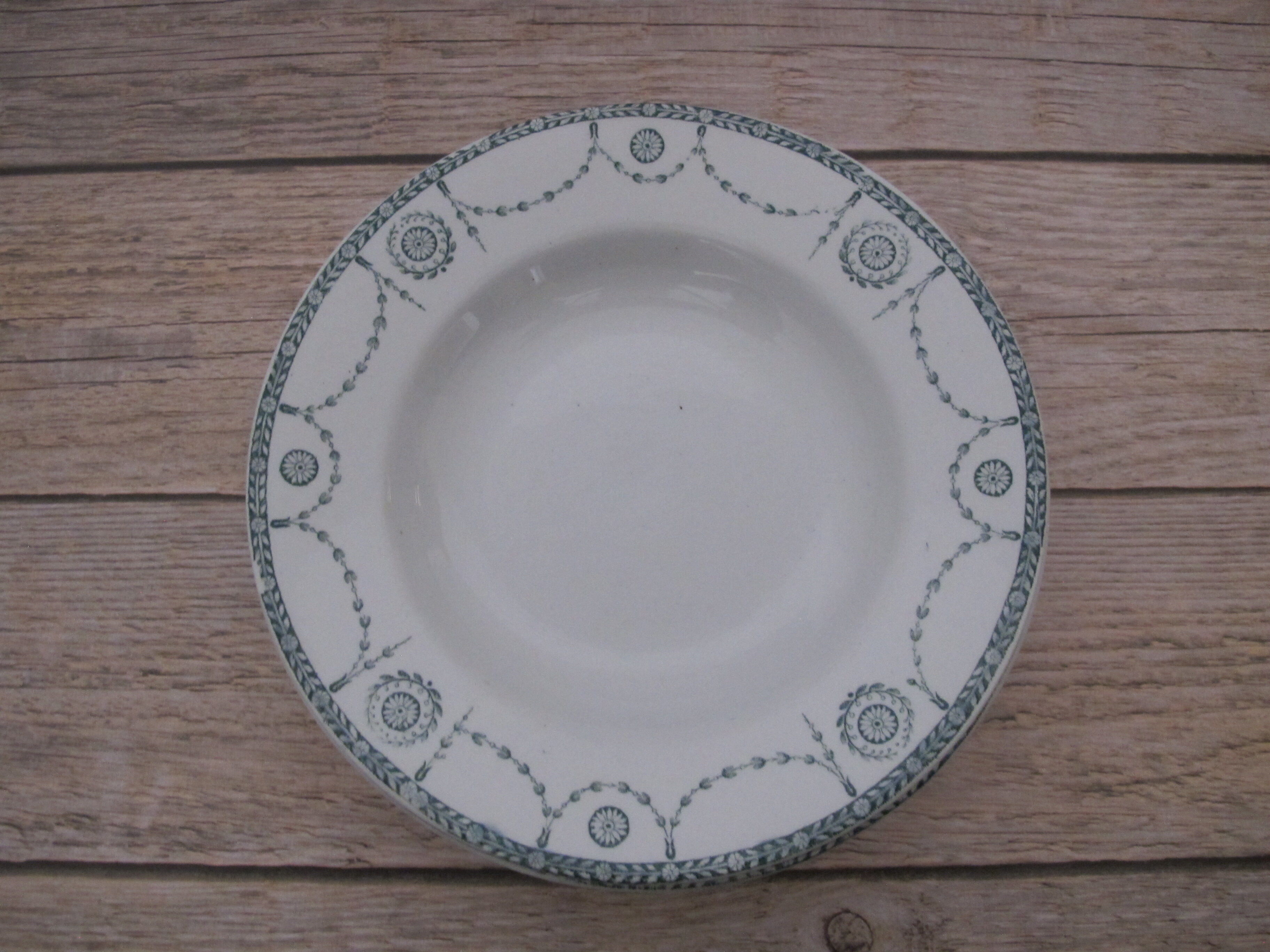 Set of 9 hollow plates in Iron Earth of Lunéville, Bonaparte model