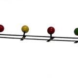 Metal coat rack in the style of Féraud