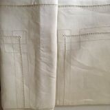 Old sheet in monogram embroidered linen thread
