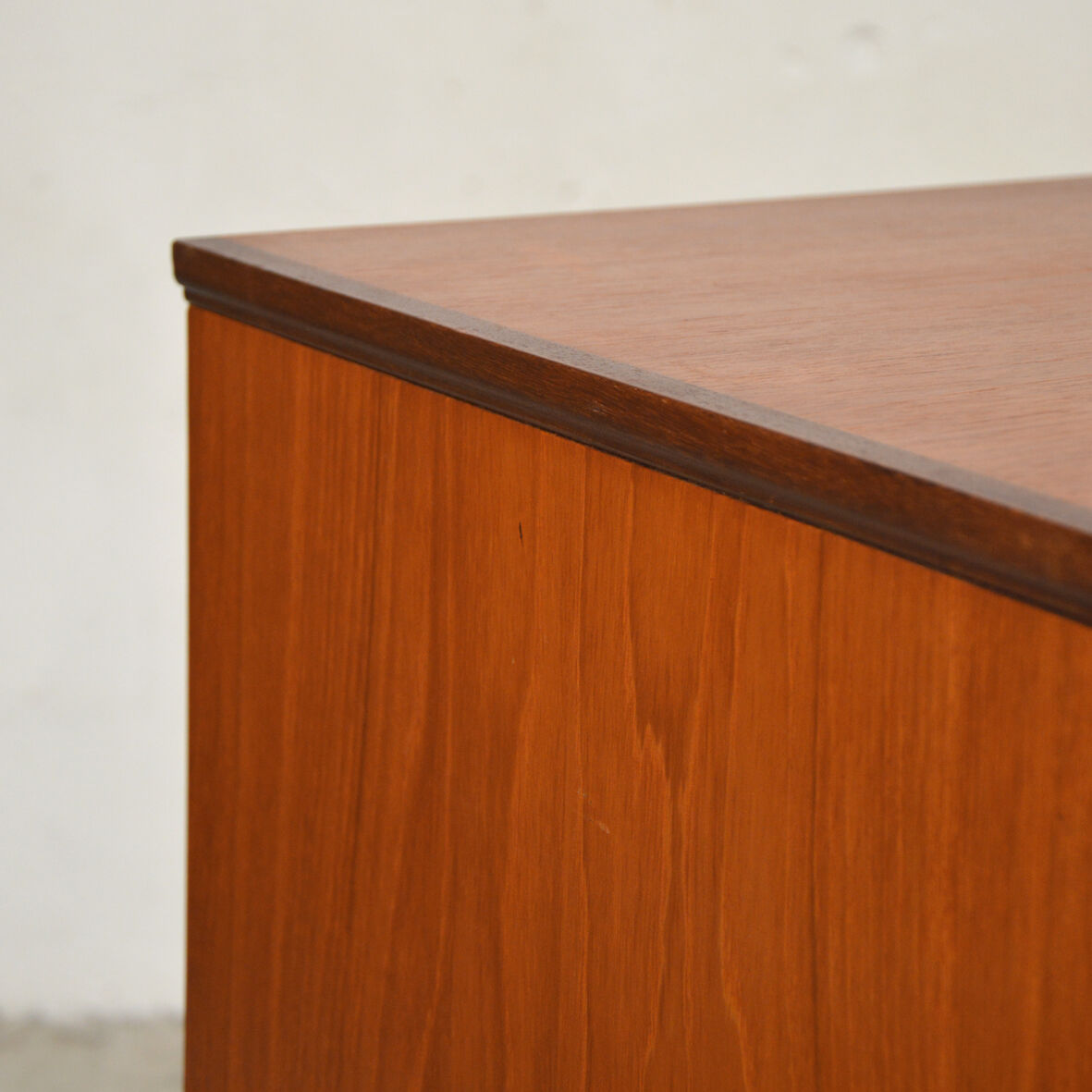 Row 3 doors clear teak, 1960