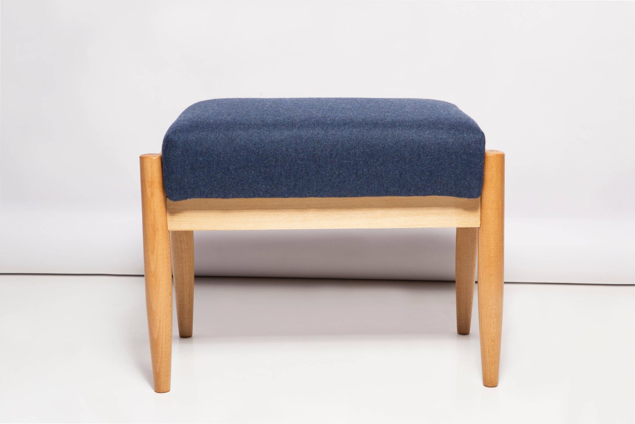 Pair of vintage navy blue wool stools from the mid-20th century, Edmund Homa, 1960s.