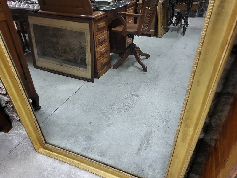 Large gilt mirror in 2 parts from the early 19th century