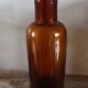 Vase flacon en verre ambré