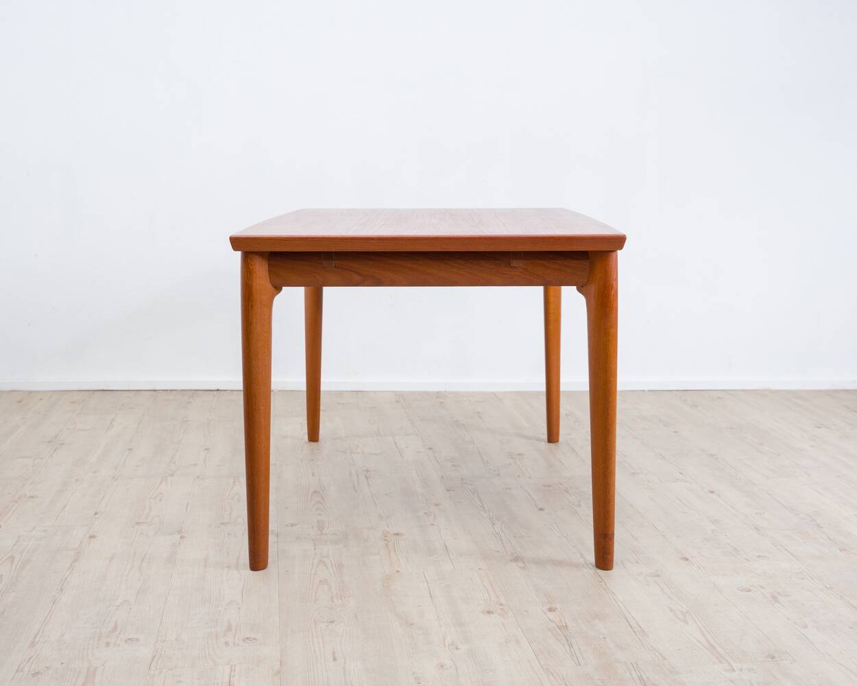 Teak dining table, made in Denmark, by the company Glos.