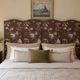 large antique headboard with 4 panels featuring Asian decor from the 1940s/50s