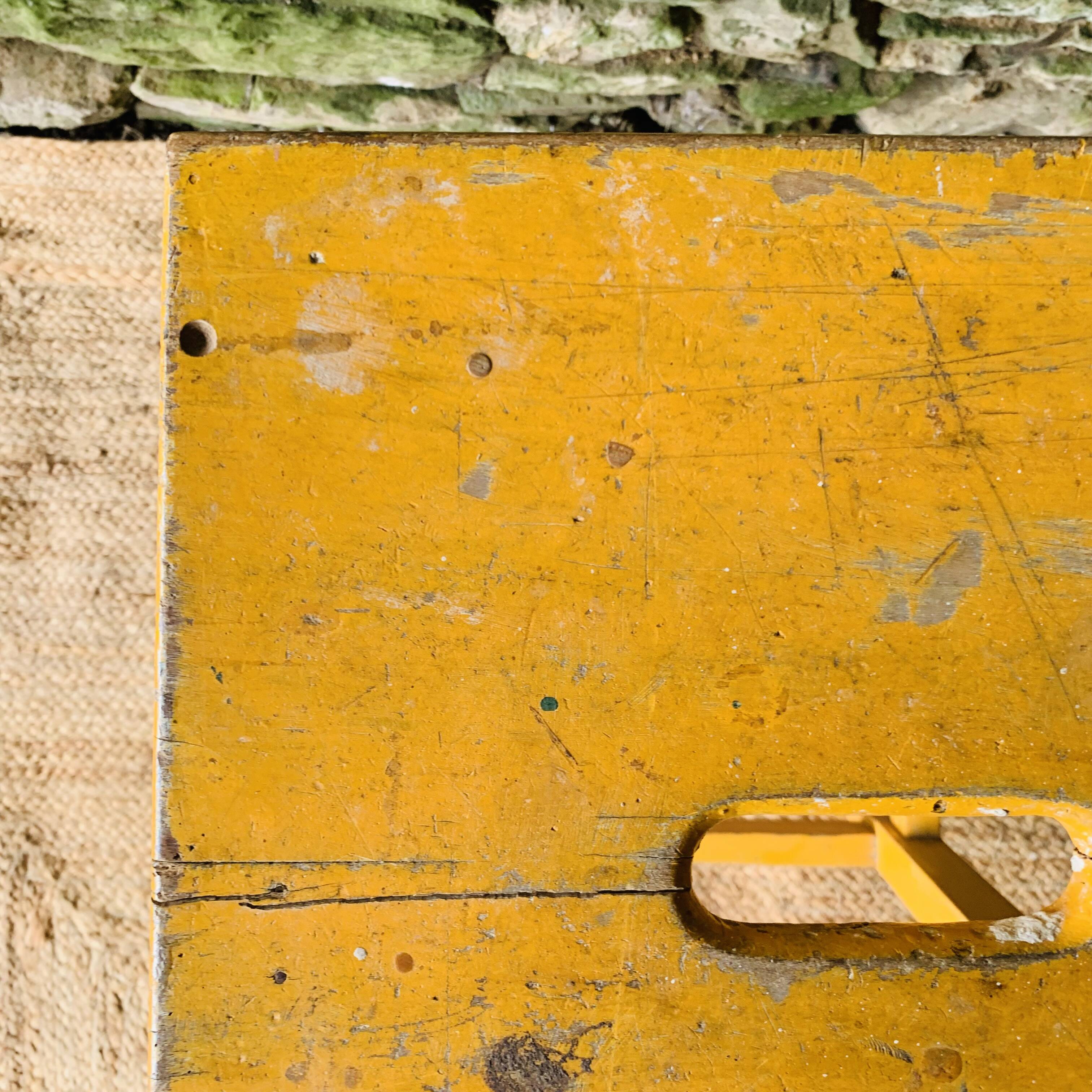 Yellow wooden high stool
