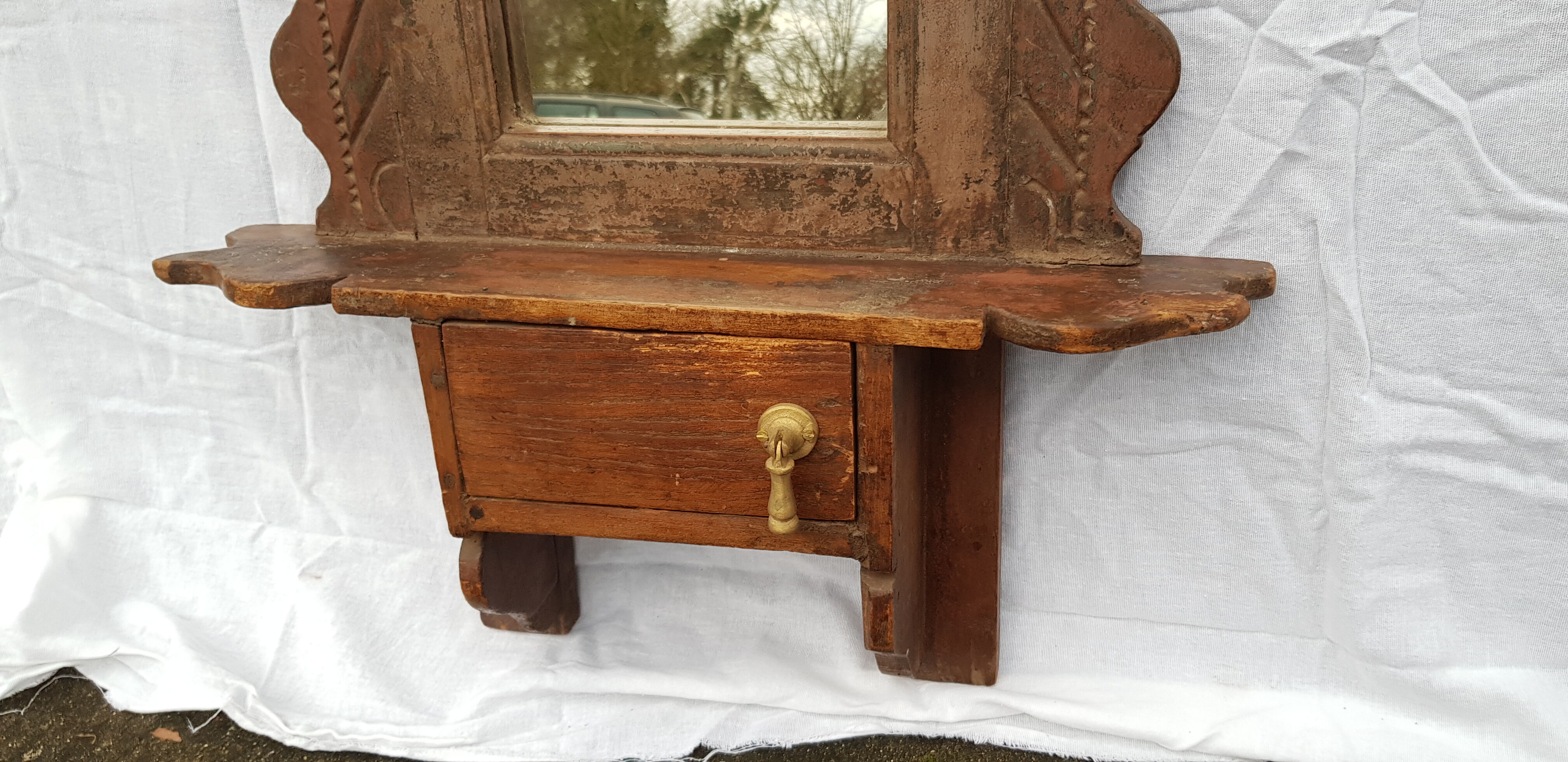 Old barber's mirror in teak