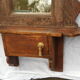 Old barber's mirror in teak