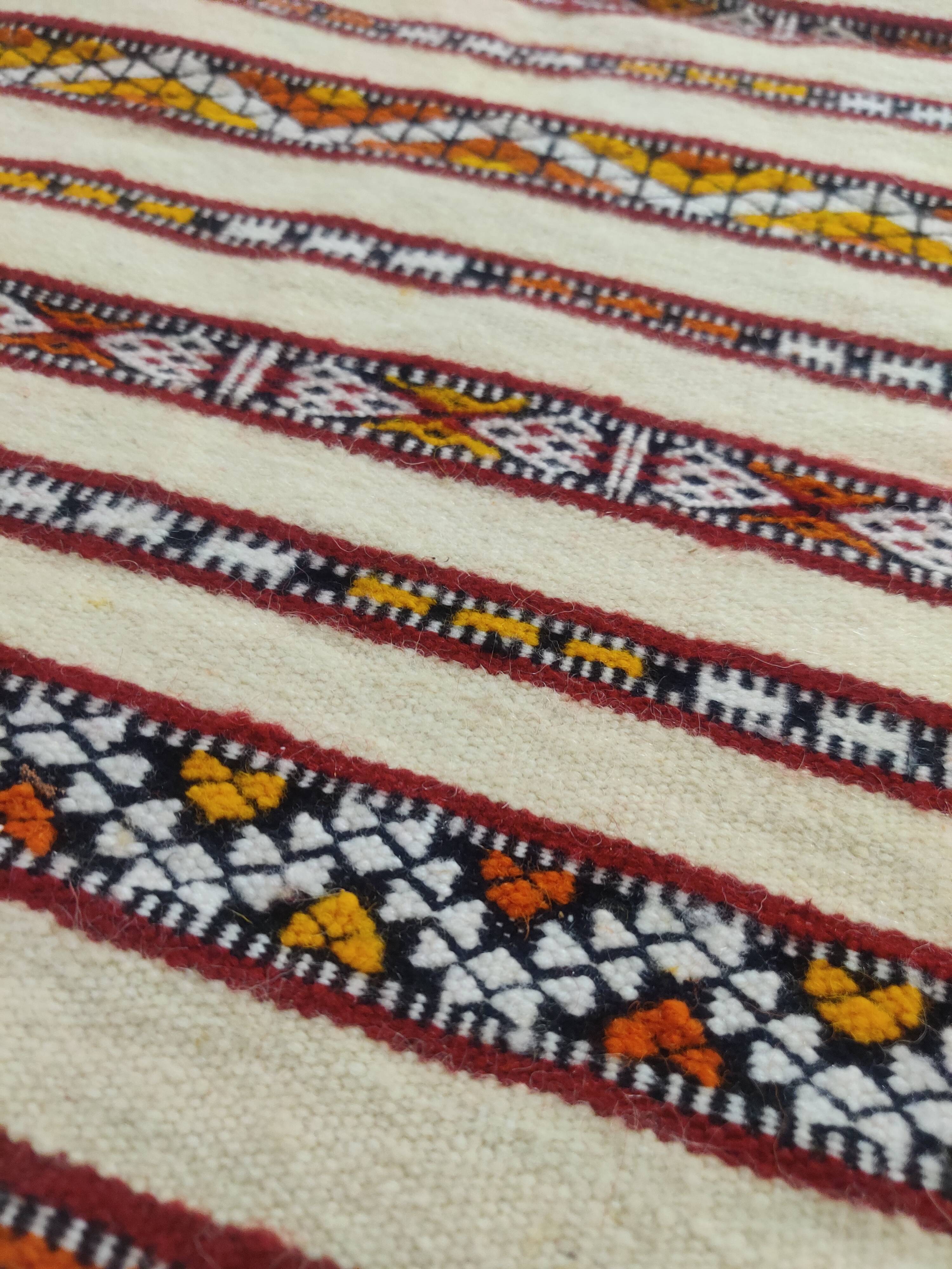 Moroccan kilim rug with bohemian patterns