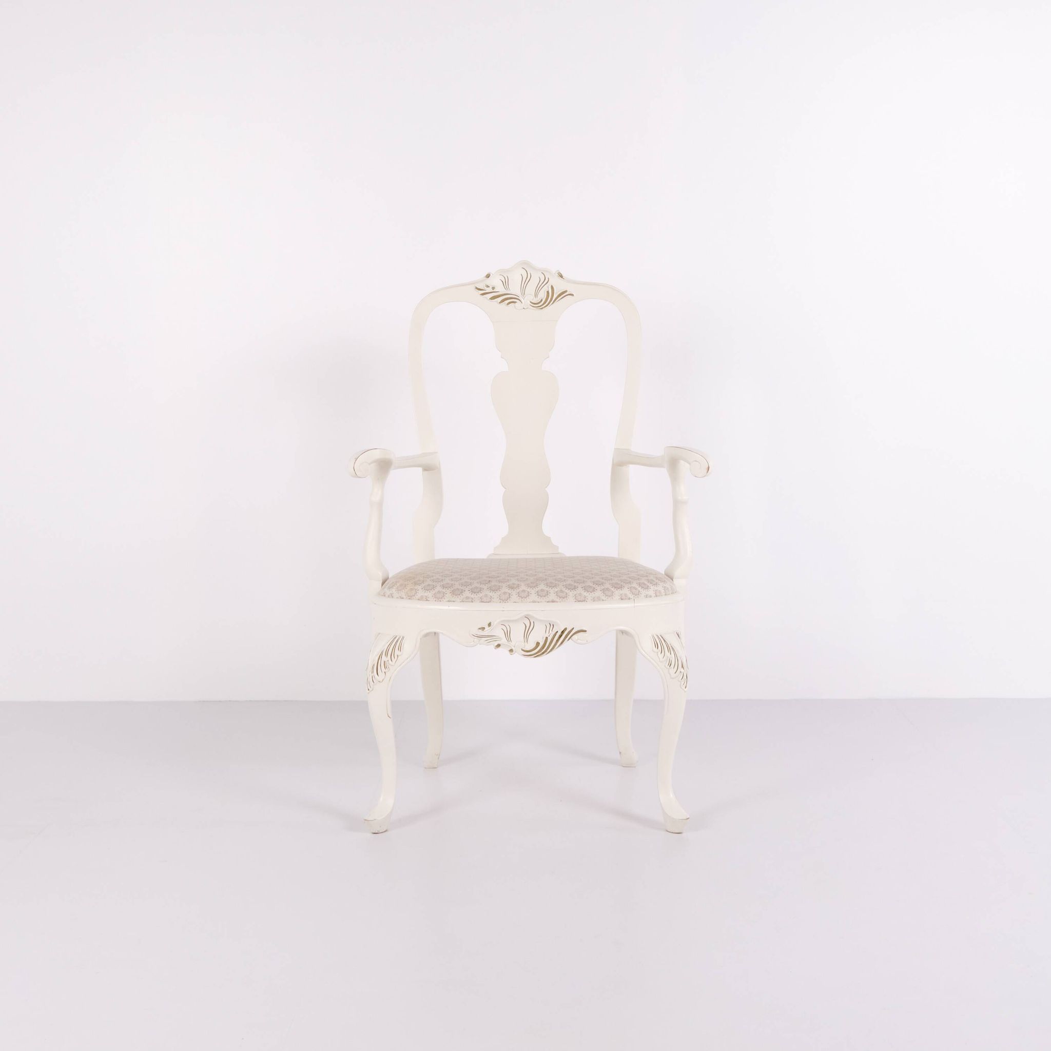 A pair of armchairs – neo rococo style – white painted with decorative details – 1920s