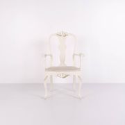 A pair of armchairs – neo rococo style – white painted with decorative details – 1920s