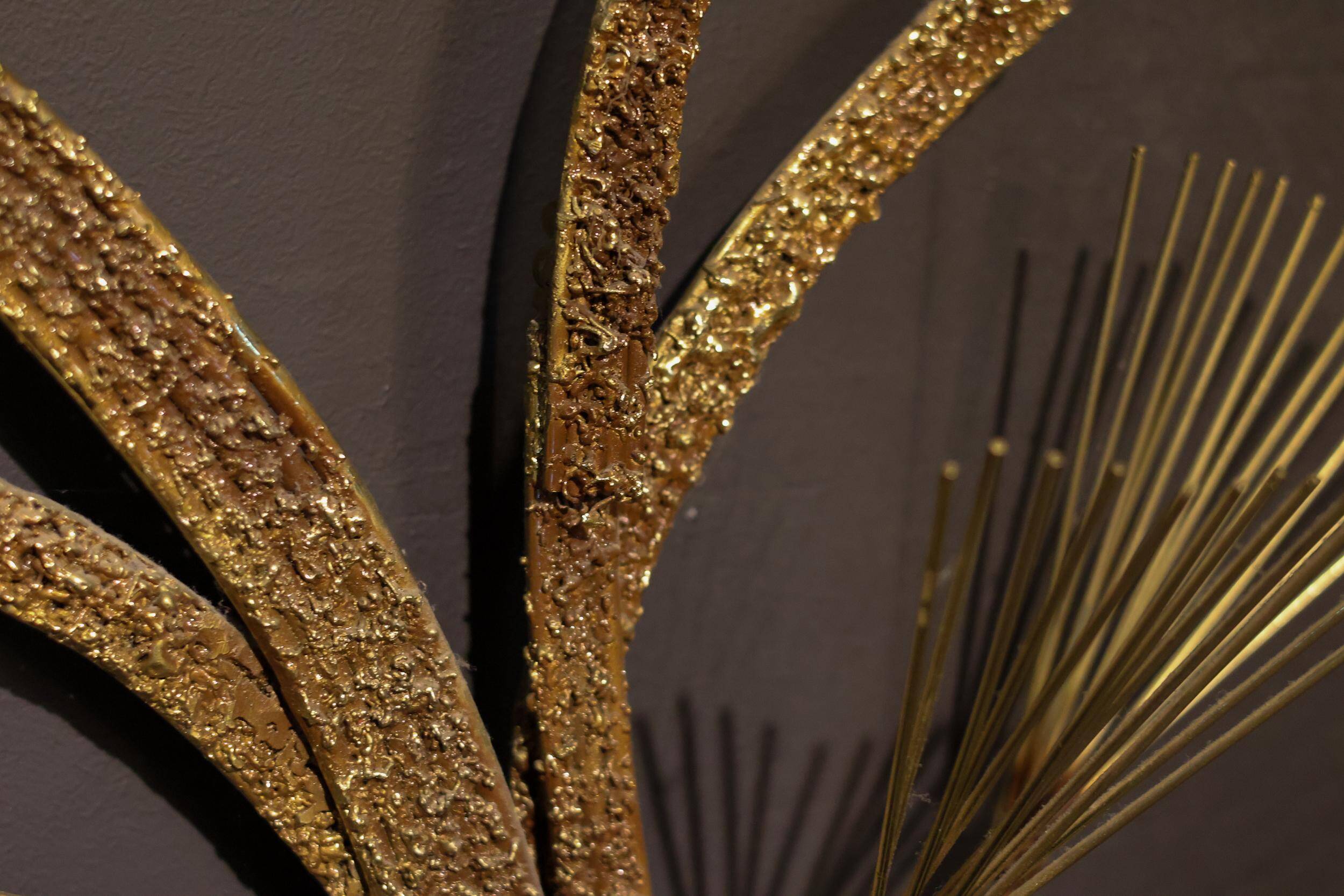 Large wall sculpture in the shape of a tree needle in brass by Curtis Jeré, mid-century modern.