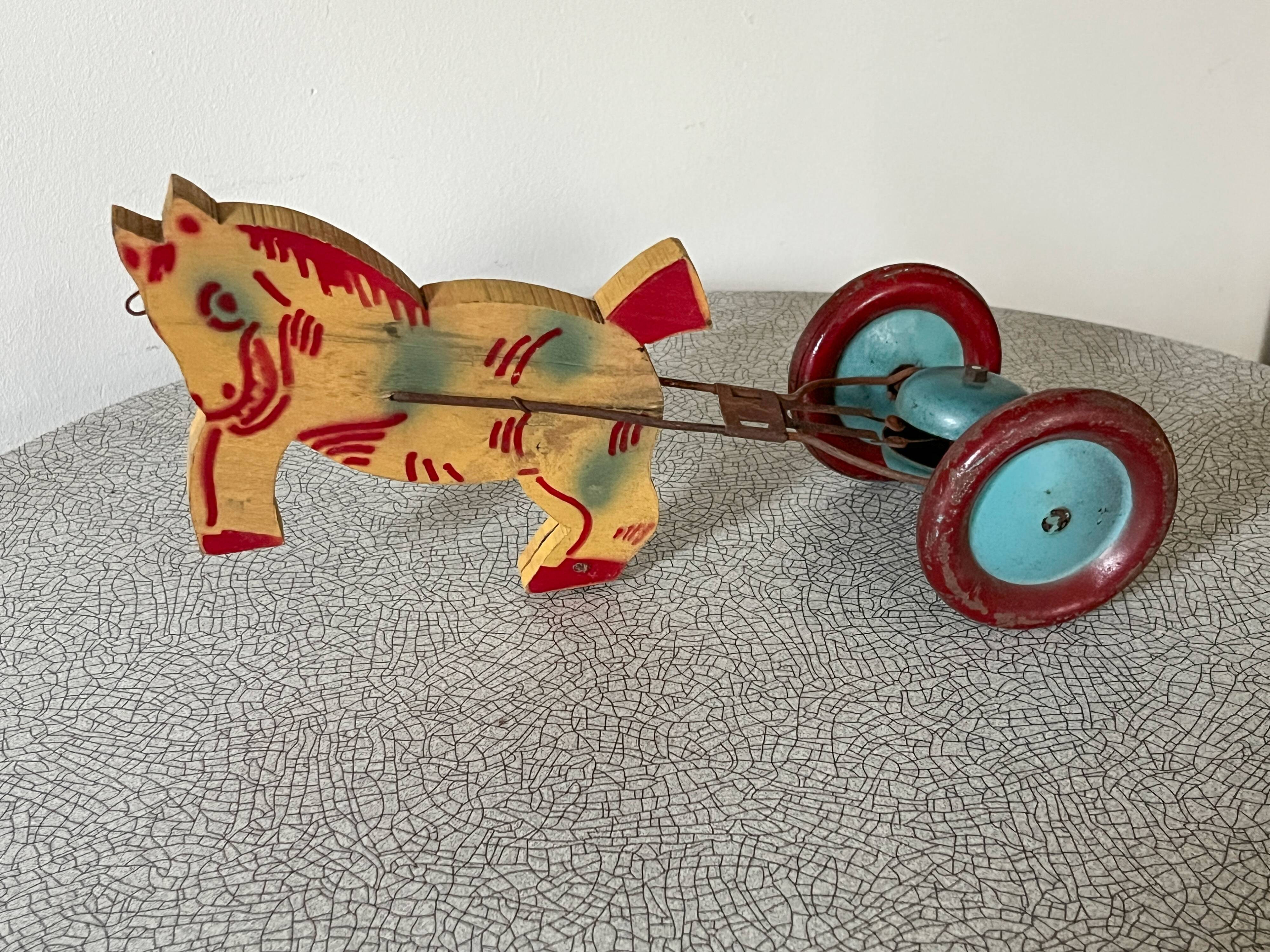Vintage pull-along toy, horse-drawn with a bell, musical toy
