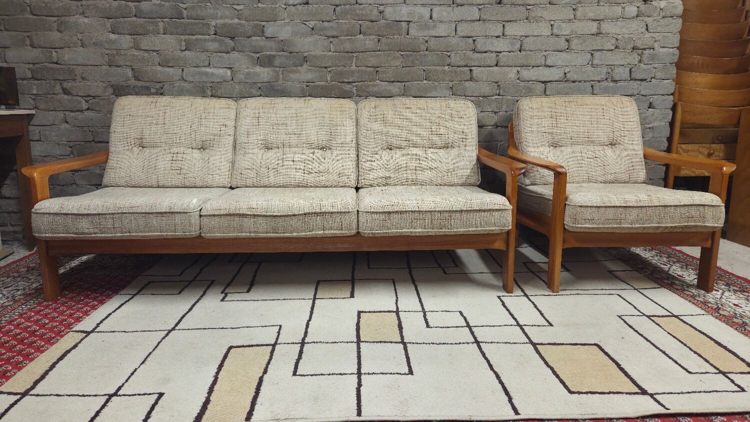 Danish canapé and its 1970s teak armchair