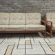 Danish canapé and its 1970s teak armchair