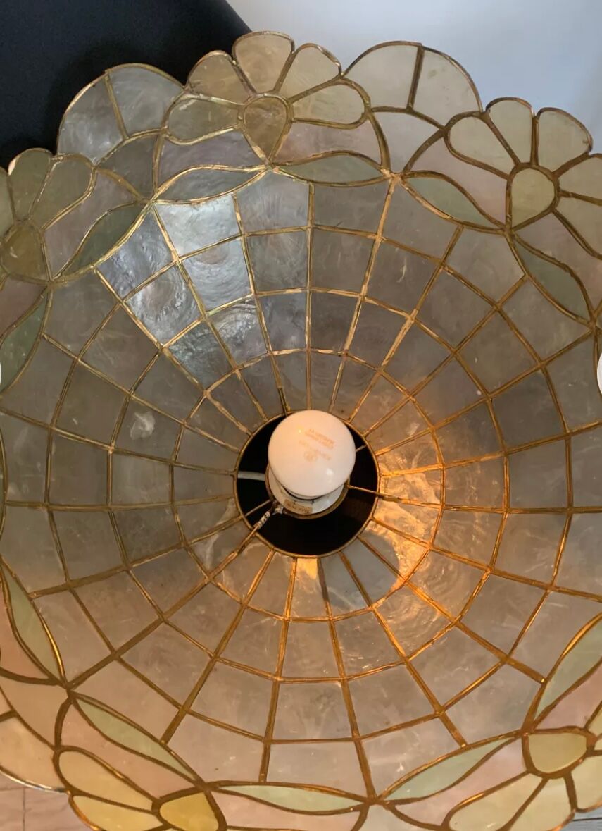 Mother-of-pearl and brass suspension
