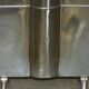 Art Deco fire screen from around 1920 in polished chrome with a bear.