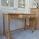 Vintage kitchen table on casters.