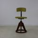 Fifties design working chair with stabilizing wooden ring base