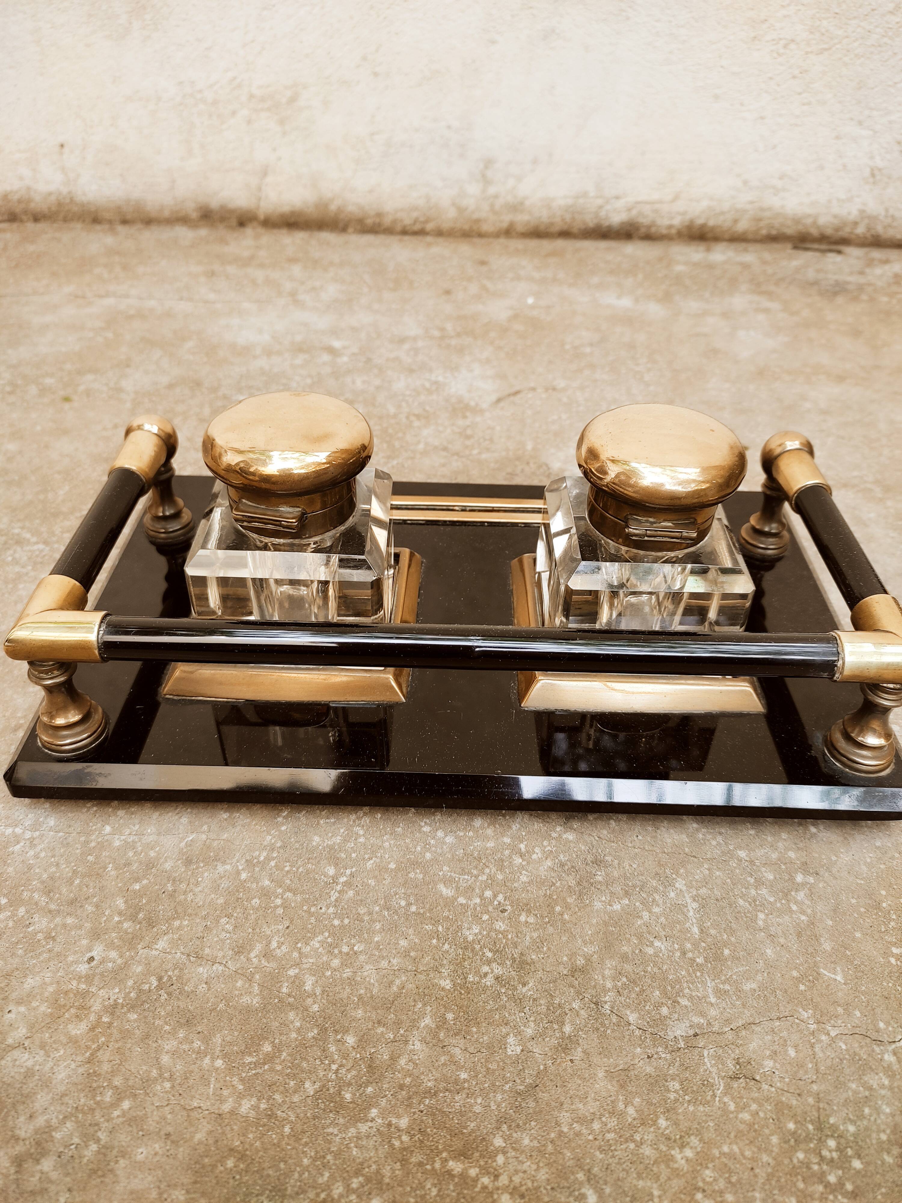 Hence the art deco inkwell on jet plate brass finishes