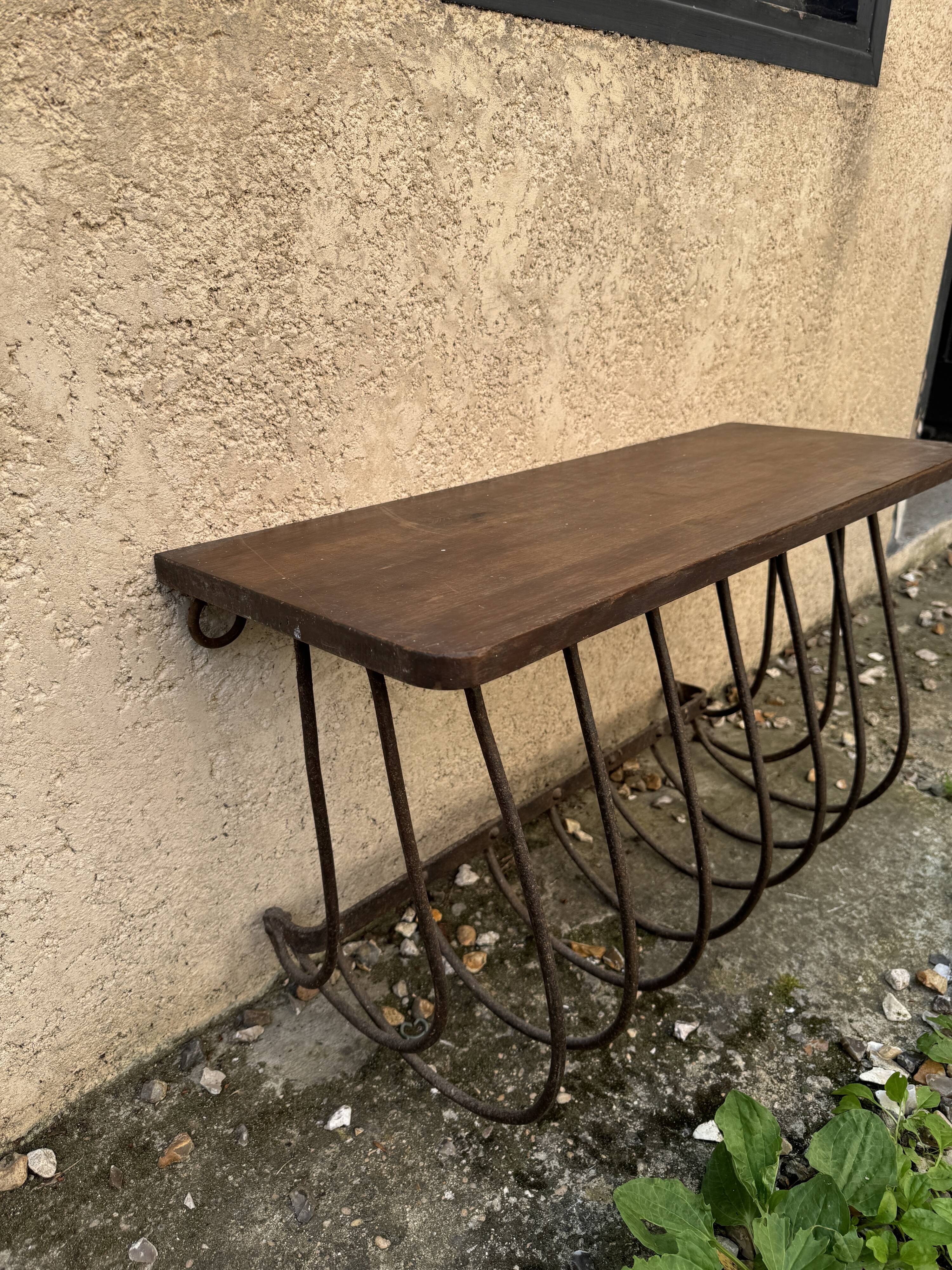 Old iron and wood console measures approximately: height 45 cm length 80 cm, depth 30.5 cm