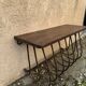 Old iron and wood console measures approximately: height 45 cm length 80 cm, depth 30.5 cm