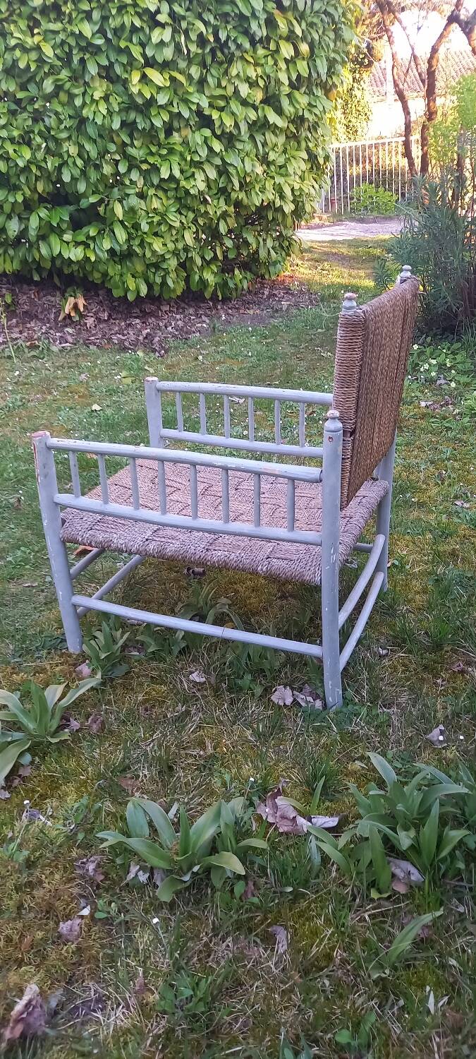 Rope-woven wooden armchair