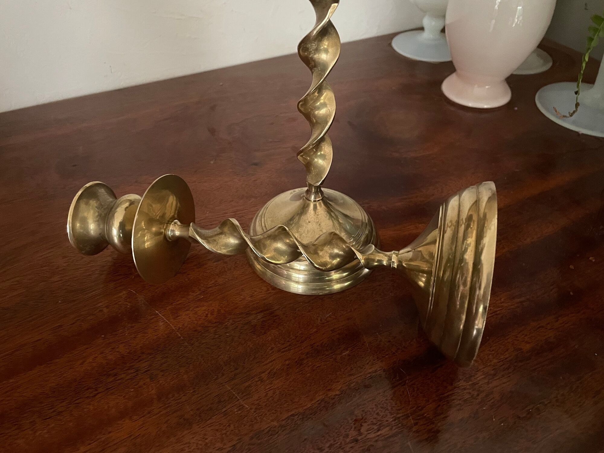 Pair of twisted brass candle holders